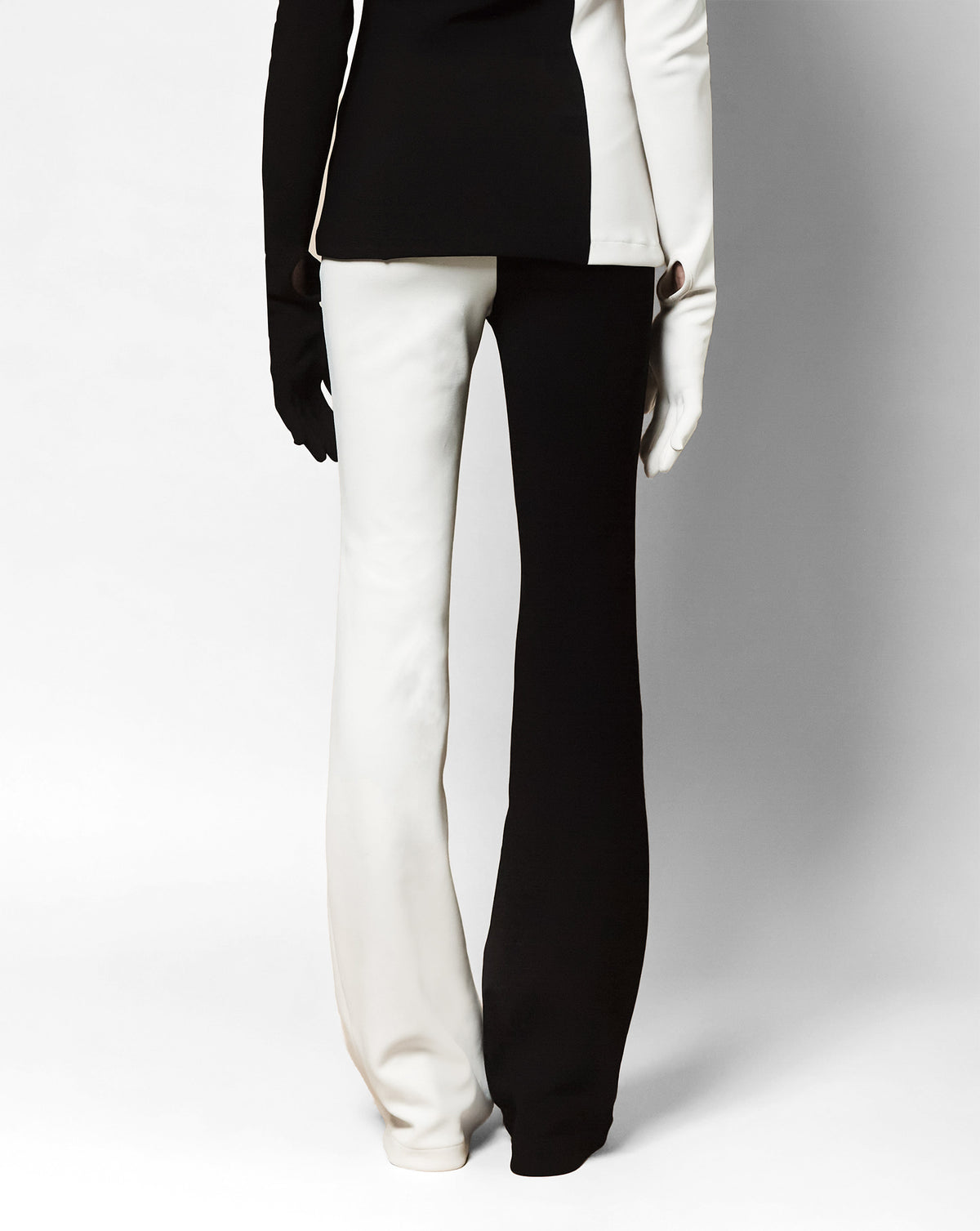Josephine high-waisted flare pant in black and champagne, back view