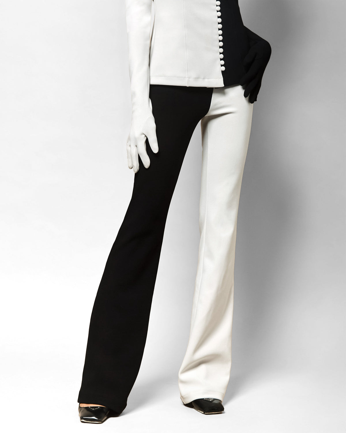 Josephine high-waisted flare pant in black and champagne, front view