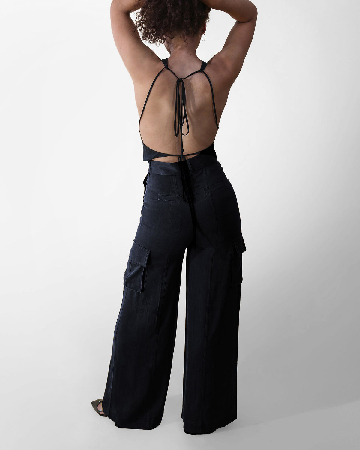 Aurora high-rise cupro pant in black, back view