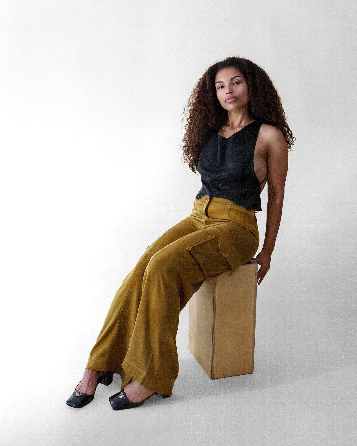 Kristine reversible cupro tank top in moss and black, three-quarter view